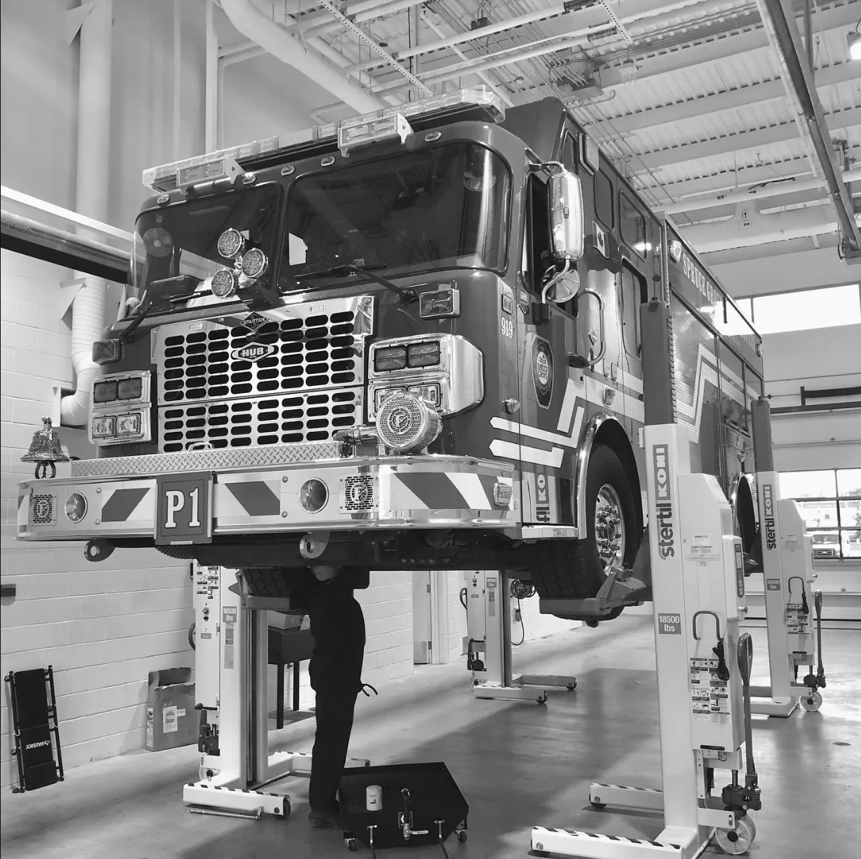 Engine P1 on service lift stands, black and white